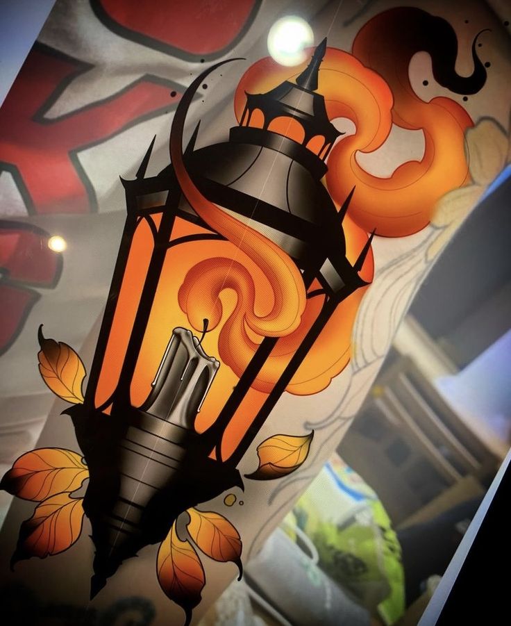 a street light painted on the side of a building with flames coming out of it