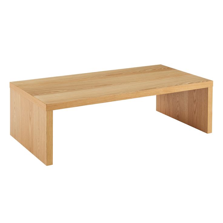 a wooden table sitting on top of a white floor