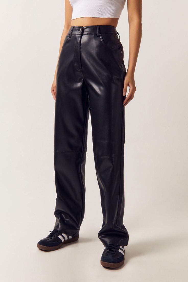 Perfect pins. Feel confident in our straight leg pants, made in smooth, sleek faux leather fabric, with an ultra flattering straight leg fit, and a stellar high waistline. Style with a crop top and sneakers for an elevated daytime look, or with a corset top or blouse for a day to night look perfect for date nights and happy hours. Faux Leather Straight Leg Pants High Quality Faux Leather Flattering Straight Leg Fit Pocket Features Comfortable High Waistline Button and Zip Front Fastening Model wears a size M (US size 6/UK size 10). Faux Leather Straight Leg Pants, Happy Hours, Oasis Fashion, Faux Leather Fabric, Leather Trousers, Faux Leather Pants, Straight Leg Trousers, Night Looks, Fashion Face