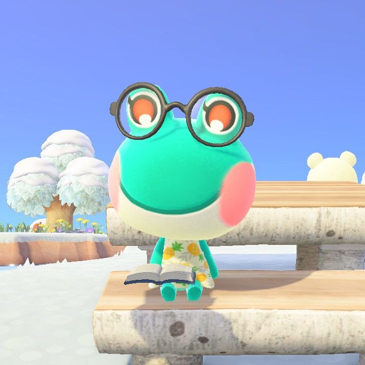 a cartoon frog wearing glasses riding a skateboard on a wooden bench in the snow