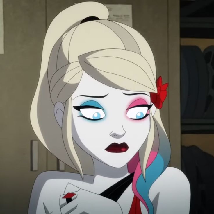 a cartoon character with blue eyes and blonde hair wearing a red bow around her neck