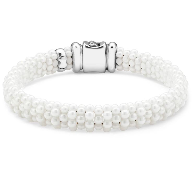 A white ceramic Caviar bracelet that is finished with a sterling silver box clasp. Classic Sterling Silver Bracelet With Polished Beads, Luxury White Sterling Silver Adjustable Bracelet, Luxury Adjustable White Sterling Silver Bracelet, White Gold Beaded Bracelet With Sterling Silver Clasp, Adjustable Single Strand White Bracelet, Classic Formal Bracelets With Polished Beads, Classic Sterling Silver Bracelet With Spacer Beads, Classic Beaded Stretch Bracelet, Classic White Bracelets With Sterling Silver Clasp