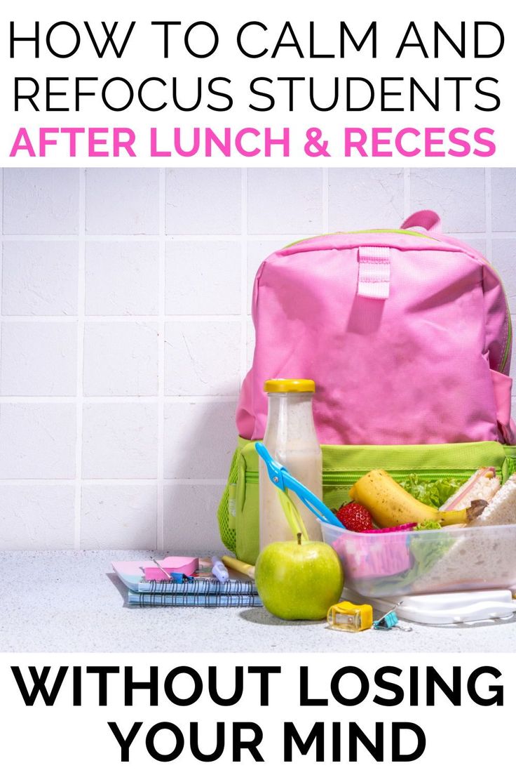 a pink lunch bag sitting on top of a counter next to an apple and milk bottle