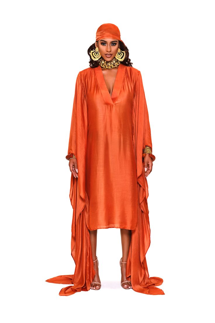 This KELSA KAFTAN is the perfect addition to your wardrobe. Its lightweight fabric, relaxed fit and lack of stretch make it comfortable and breathable, while the side sleeve details and V neck front add a stylish touch. Crafted to move with you throughout the day yet look effortlessly chic. ACCESSORIES ARE NOT INCLUDED Style tip: Perfect match with KELSA SCARF Product Description: Color: Orange Lightweight fabric Flowy and breath able Side sleeve details V neck front Relaxed, easy fit Falls loos Kaftan Loungewear, Kaftan Ideas, Kaftan Outfit, Kaftan Designs, Indian Bride Outfits, Bride Outfits, Bride Clothes, Chic Accessories, Sleeve Detail