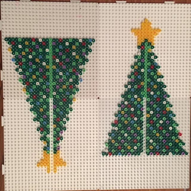 two christmas trees made out of plastic beads