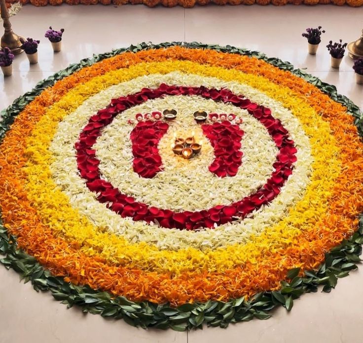 a circular flower arrangement on the floor