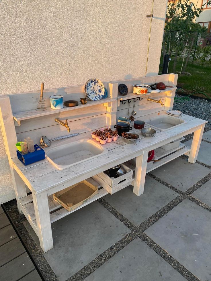 an outdoor kitchen made out of pallet wood