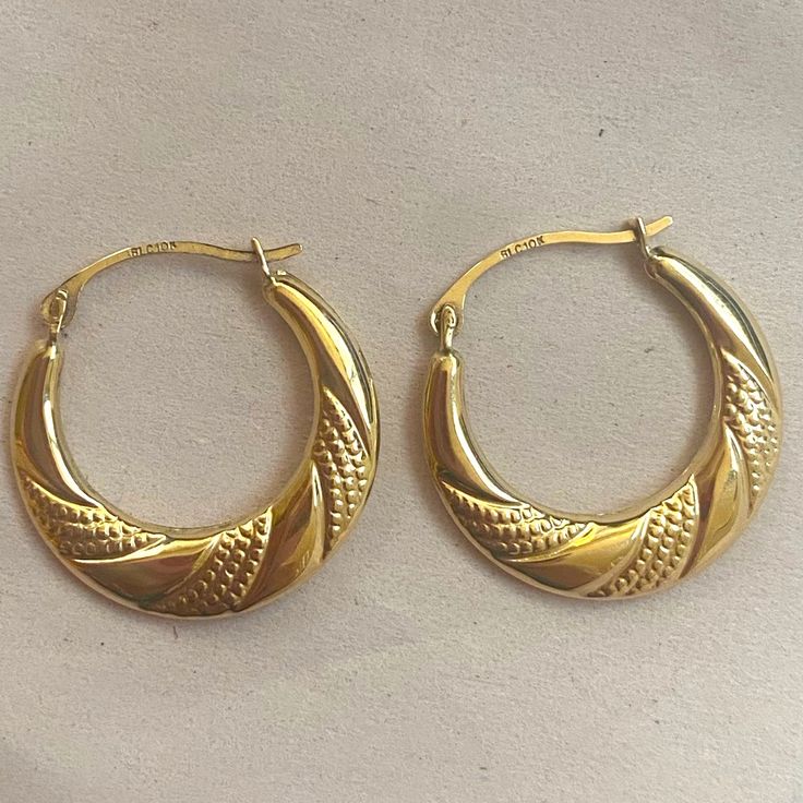 Everyday Classic Hoops Crafted In Solid 10k Gold Measures: .75” Round Textured Design Hinged Back Closure Small Hinged Hoop Earrings As Gift, Hinged Hoop Earrings For Anniversary, Small Hoop Hinged Earrings For Anniversary, Handmade Hoop Earrings For Anniversary, Handmade Yellow Gold Hoop Earrings, Wedding Earrings Studs, Black Cat Earrings, Marquise Earrings, Vintage Gold Earrings