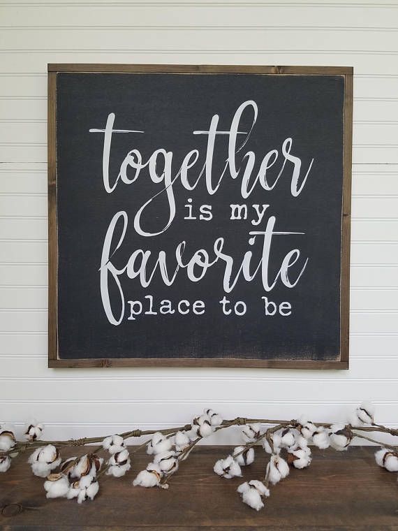 a black and white sign that says together is my favorite place to be on the wall