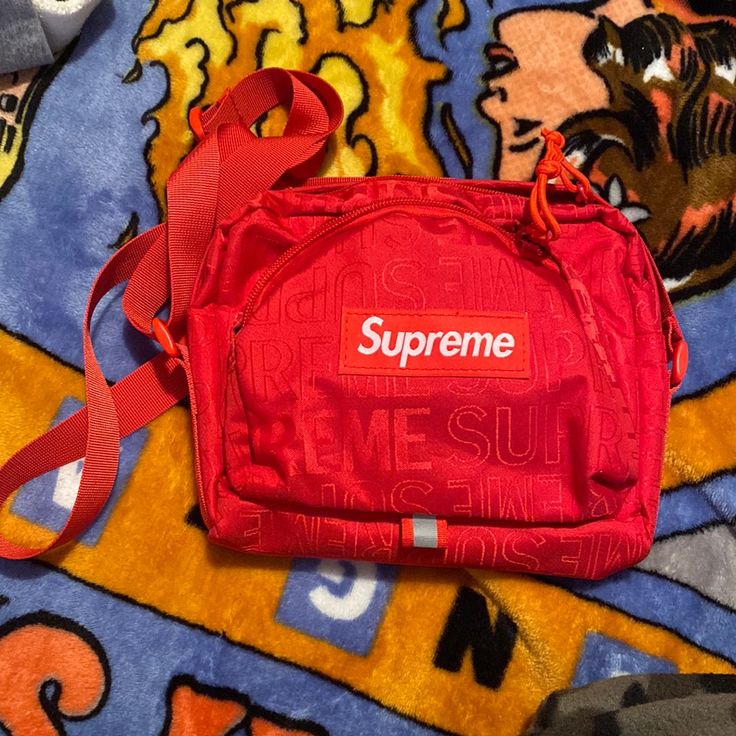 Supreme Shoulder Bag Ss19 Drop Brand New Designer Large Capacity Red Shoulder Bag, Designer Red Shoulder Bag With Large Capacity, Red Shoulder Bag With Logo, Red Logo Shoulder Bag, Red Tote Bag With Logo, Designer Red Shoulder Bag For Travel, Red Logo Crossbody Shoulder Bag, Designer Red Pouch Shoulder Bag, Red Rectangular Bag With Logo