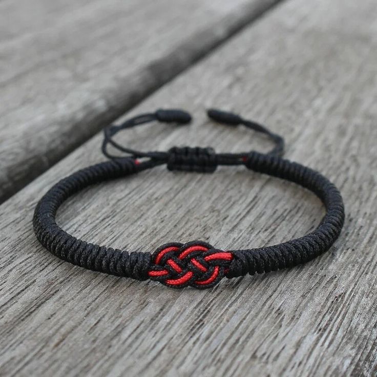 Adjustable bracelet Cotton Cord Casual Red Braided Bracelets As Gift, Casual Red Braided Bracelets For Gift, Casual Black Hand-wrapped Bracelets, Casual Black Hand Wrapped Bracelets, Casual Jubilee Bracelet Jewelry, Casual Bracelets With Sliding Knot For Gift, Casual Sliding Knot Bracelets As Gift, Casual Sliding Knot Bracelet As Gift, Casual Sliding Knot Bracelets For Gift