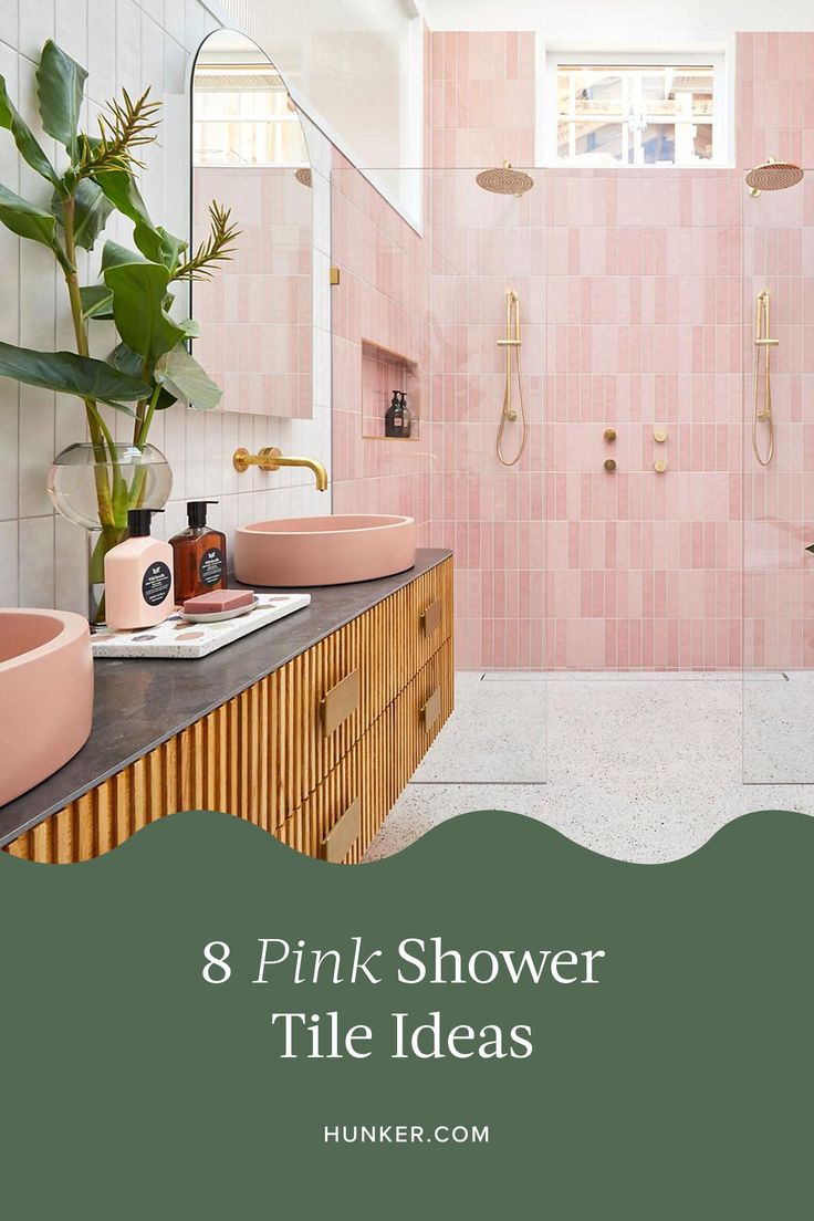 a pink bathroom with two sinks and a large mirror over the bathtub is featured in this article