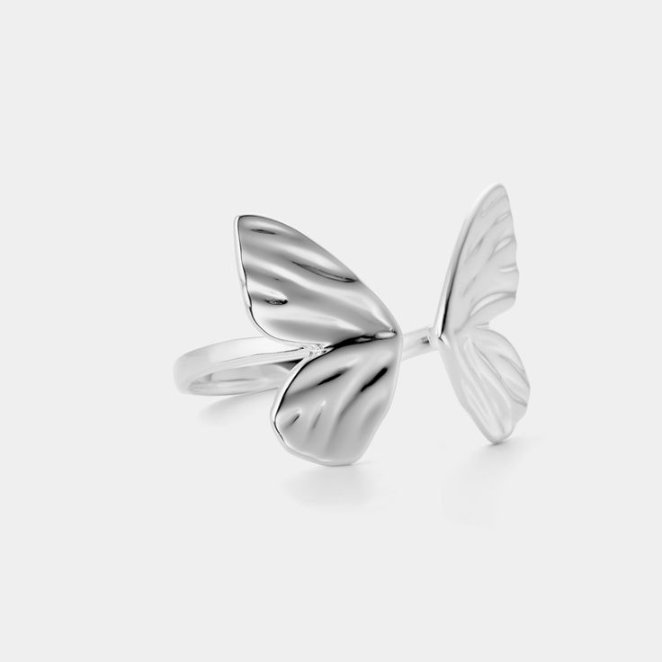 This stunning piece of jewelry artfully crafted with a delicate silver butterfly motif will make an exquisite addition to any jewelry box. The captivating design of the butterfly will bring a unique and sophisticated touch to any ensemble. DETAILS Materials:  Sliver Size: Adjustable Weight:  3.31g Butterfly-shaped White Gold Jewelry For Wedding, White Gold Butterfly Jewelry For Wedding, Butterfly-shaped Sterling Silver Jewelry For Wedding, Silver Butterfly Jewelry For Wedding, Delicate Butterfly White Gold Jewelry, Delicate White Gold Butterfly Jewelry, Silver Jewelry With Butterfly Charm For Formal Occasions, Silver Butterfly Jewelry For Formal Occasions, Silver Sterling Silver Jewelry With Butterfly Clasp