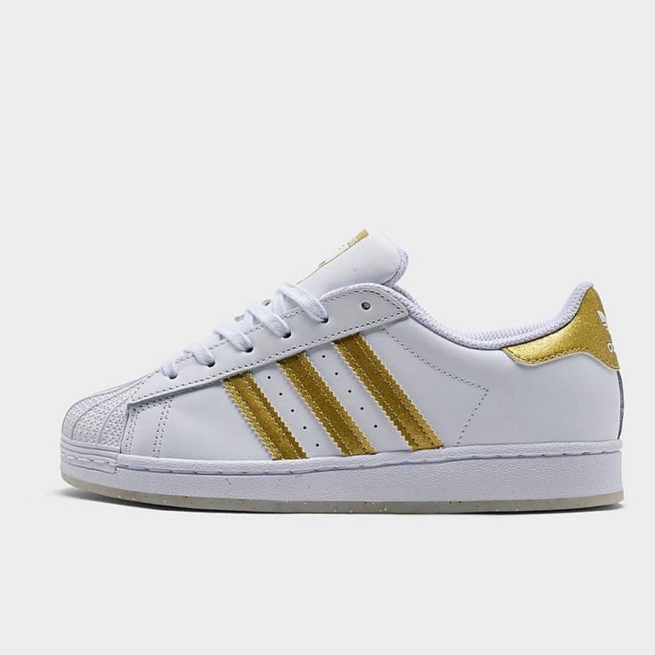 Girls White And Gold Adidas Sneakers Brand New Adidas White High-top Skate Shoes, Sporty Gold Sneakers For Spring, White Adidas Sneakers With Round Toe, White Adidas Slip-on Sneakers, Adidas White Slip-on Sneakers, Adidas White Slip-on Skate Shoes, White Skate Shoes With Gum Sole For Spring, White Adidas Lace-up Skate Shoes, Gold Slip-on Sporty Sneakers