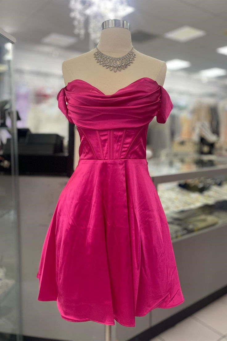 Expertly crafted from high-quality fuchsia satin fabric, this stunning Off the Shoulder Short A-line Dress features an elegant A-line silhouette, a ruched neckline, and an above-knee length. The off the shoulder design adds a touch of sophistication, while the lace-up back ensures a perfect fit. SKU: 3548 Fuchsia color Satin material A-line silhouette Off the shoulder Ruched neck Above knee length Lace-up back Ship in 7-10 business days Size: US 2-16. We offer free returns in 7 days. Please refer to our return policy page for more details. If you have any questions, don't hesitate to contact us: at service@dressesforparty.com. Pink Homecoming Dress Short, Prom Dress Hot Pink, Hot Pink Homecoming Dresses, Hot Pink Party Dresses, Hot Pink Homecoming, Hot Pink Cocktail Dress, Hot Pink Party, Pink Homecoming Dresses, Short A Line Dress