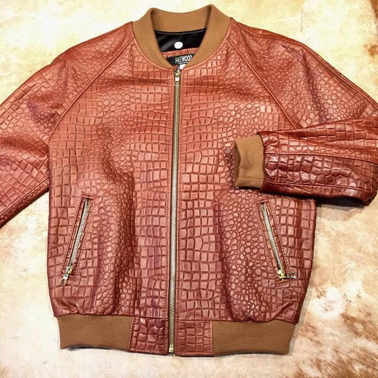 Jakewood Cognac Embossed Alligator Bomber Jacket - Dudes Boutique Fall Leather Jacket With Crocodile Pattern, Luxury Leather Outerwear With Crocodile Pattern, Luxury Crocodile Pattern Leather Jacket For Winter, Luxury Winter Outerwear With Crocodile Pattern, Fitted Leather Jacket With Crocodile Pattern For Fall, Luxury Crocodile Pattern Winter Outerwear, Fitted Crocodile Pattern Leather Jacket For Fall, Leather Outerwear With Crocodile Pattern And Long Sleeves, Luxury Brown Leather Jacket For Fall