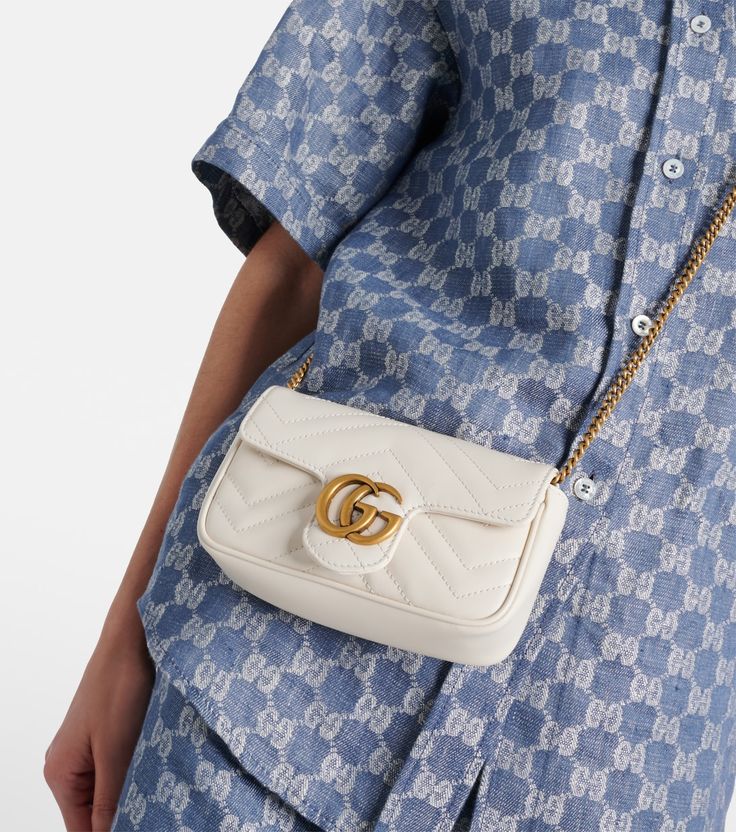 GG Marmont Super Mini shoulder bag in white - Gucci | Mytheresa Classic Quilted Gucci Shoulder Bag, Luxury White Quilted Shoulder Bag, Luxury Quilted Gucci Bag, Gucci Quilted Formal Shoulder Bag, Gucci White Bag, White Gucci Bag For Everyday Luxury, White Luxury Gucci Shoulder Bag, Luxury White Gucci Shoulder Bag, Gucci Marmont Mini