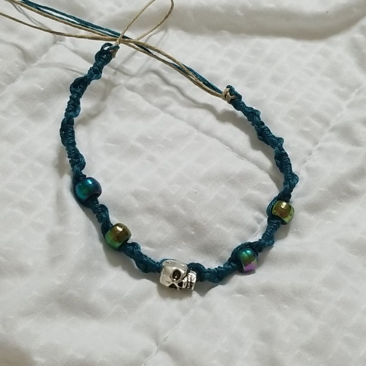 New! Handmade Skull Hemp Bracelet Teal String Natural Colored Hemp Purple/ Green / Teal Pony Beads Silver Skull Bead Closure: Hoop & Tie Handmade Skulls, Hemp Bracelet, Hemp Bracelets, Beaded Skull, Hand Crafted Jewelry, Pony Beads, Crafted Jewelry, Purple Green, Womens Jewelry Bracelets