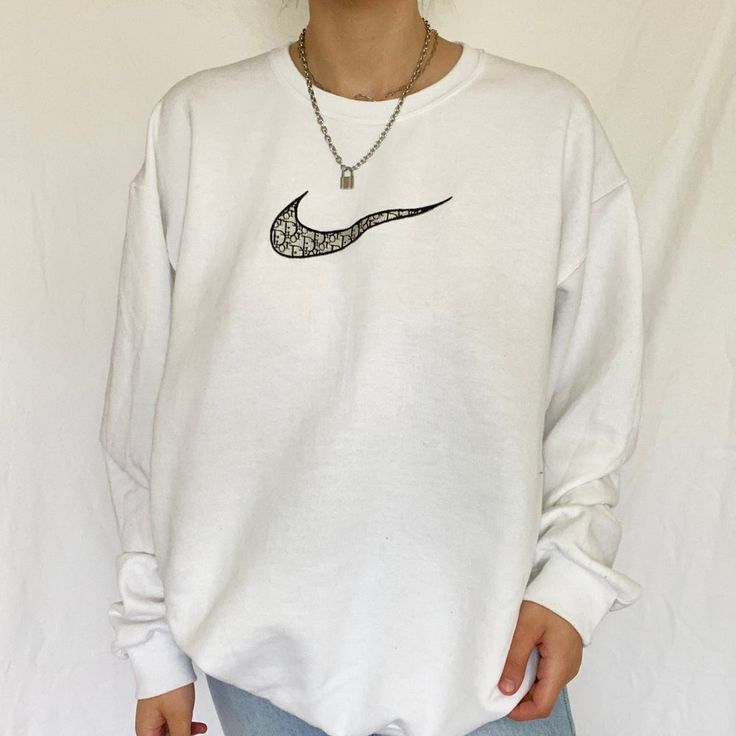 cotton/poly white crewneck with embroidered design! unisex adult sizing. these are made to order! please allow 2-4 weeks for shipment ᵕ̈ model is 5'5, usually a size small & wearing a size large. White Cotton Crew Neck Sweater, White Pre-shrunk Sweatshirt For Streetwear, White Sweatshirt For Streetwear, Trendy White Crew Neck Sweater, White Basic Crew Neck Sweater, Casual Long Sleeve T-shirt With Custom Print, Trendy Crew Neck Sweater With Screen Print, Trendy White Crew Sweatshirt, White Graphic Print Crew Neck Sweater