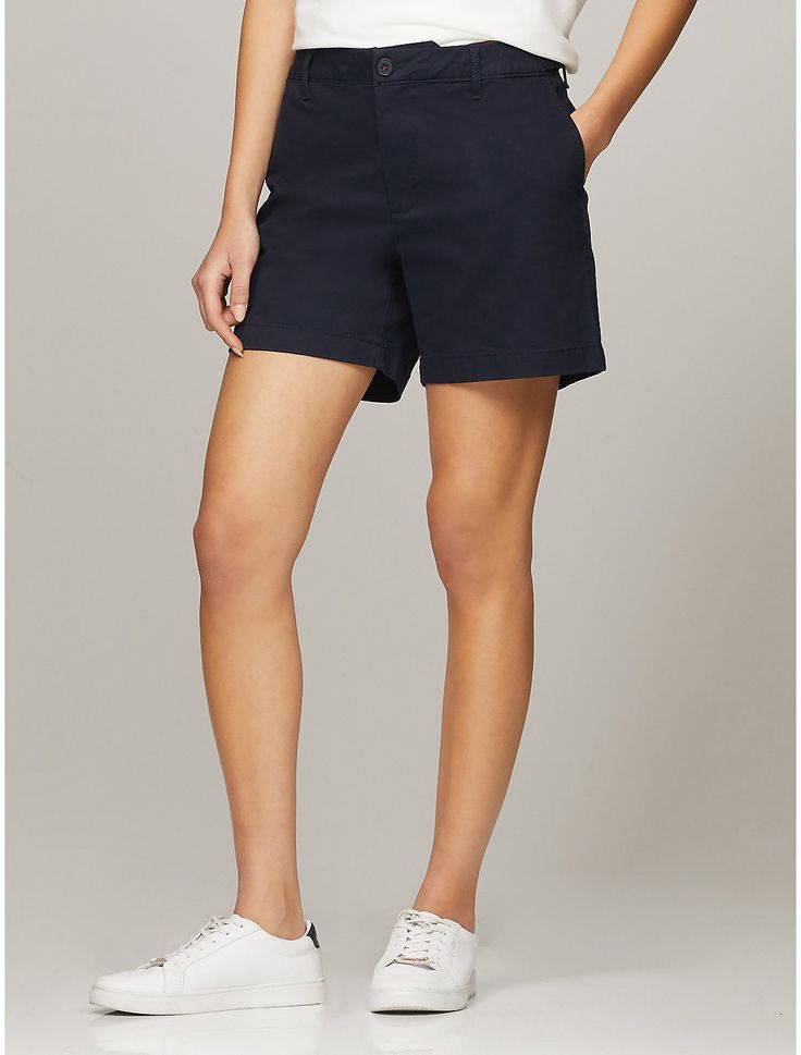 Tommy Hilfiger women's short. Made from soft, stretch fabric and cut in an easy fit, our go-to short is comfortable and flattering.  Material: 77% Cotton, 20% Reprocessed Cotton, 3% Elastane. Classic High-waisted Bermuda Shorts With Relaxed Fit, Classic High-waisted Bermuda Shorts, Classic Mid-rise Shorts With Built-in Shorts, Relaxed Fit Mid-rise Cotton Shorts, Solid Relaxed Fit Bermuda Shorts, Casual Mid-rise Bottoms By Tommy Hilfiger, Workwear Bermuda Shorts, Casual Bermuda Shorts For Work, Cotton Workwear Shorts