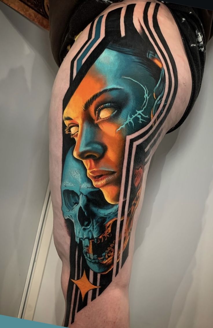 a woman's leg with a tattoo on it and a skull in the middle