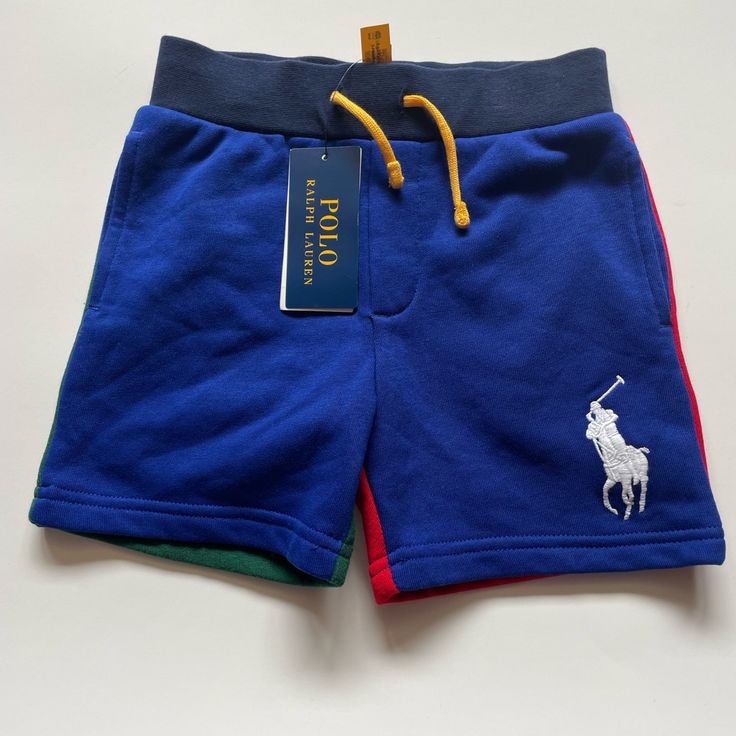 Brand New With Tag Active /Graphic Shorts Size: 3t Color: Blue At Front/ Red And Green On The Back To Side Pocket 100% Authentic! From Smoke Free Home And Pet Free Environment. Playful Blue Shorts With Elastic Waistband, Casual Red Shorts For Playtime, Playful Blue Bottoms For Playtime, Sporty Blue Bottoms For Playtime, Sporty Multicolor Shorts For Playwear, Playful Blue Bottoms For Playwear, Blue Playtime Bottoms Shorts, Blue Short-length Bottoms For Playtime, Multicolor Short Bottoms For Playwear