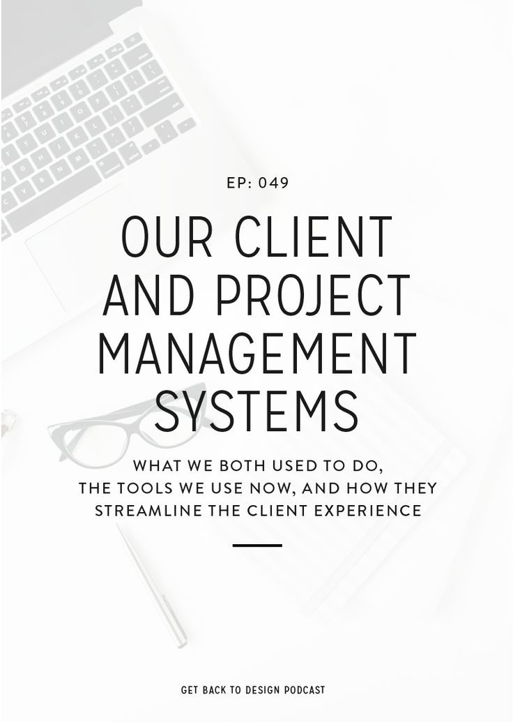 a desk with a laptop, keyboard and glasses on it that says our client and project management systems