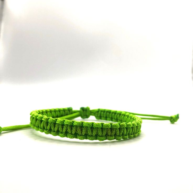 This bracelet is make with Chinese Knotting Cord about 1.5mm thin cord. The Bracelet is adjustable in size, 6 inches closed to 12 1/2 inches. Color: Light Green Feel free to contact me for any question!! *Color may slightly different due to the lighting!! ** This is HANDMADE item, the color of pattern, shape might be little different Diy String Bracelets, Green String Bracelet, Chinese Knotting Cord, Chinese Knotting, Diy Bracelets With String, Braid Bracelet, Green Diy, Surfer Bracelets, Lucky Bracelet