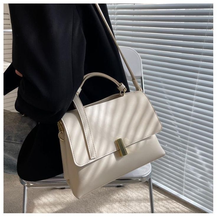 Material: PU Texture: Soft Closed: Buckle Size: 9.6"L x 4.1"W x 7.1"H in; It is enough to hold daily stuffs including cell phones, sunglasses, wallet, key etc. Baldric: Adjustable shoulder strap Elegant White Bag With Lock, White Top Handle Shoulder Bag With Turn-lock Closure, High-end Beige Handheld Box Bag, High-end White Bag With Top Carry Handle, Luxury White Shoulder Bag With Turn-lock Closure, Cross Body Bags, نظارات شمسية, Bags Tote, Women's Handbags