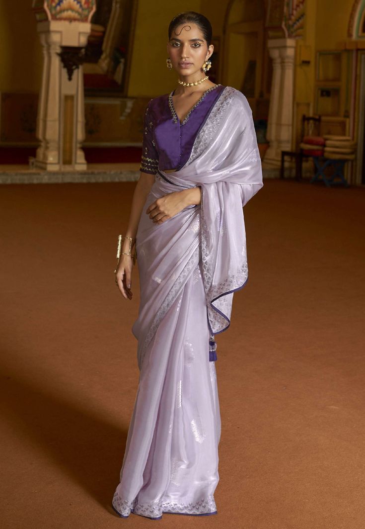 Light purple organza saree with blouse 2023  Desc:  Color : Light Purple Fabric : Organza Wash Care : Dry clean Sleeve Style : Half Sleeve Long Sleeves : Done only in Custom Stitch Sleeves Lining : Done only in Custom Stitch Bust Size : 32 to 42 Inches Occasion : Festival   Diwali   Eid   Durga Pooja   Ganesh Charturthi   Dussehra. With Express Free Shipping and Custom Stitching, Buy Indian Party wedding and bridal sarees Light purple organza saree with blouse 2023 online in USA, UK and Canada f Purple Pre-draped Saree With Zari Work For Celebration, Elegant Purple Tissue Silk Pre-draped Saree, Purple Tissue Silk Pre-draped Saree With Sheer Dupatta, Purple Pre-draped Saree With Cutdana For Party, Purple Pre-draped Saree With Cutdana For Reception, Purple Organza Pre-draped Saree For Diwali, Purple Georgette Pre-draped Saree For Festivals, Elegant Purple Chanderi Pre-draped Saree, Purple Organza Pre-draped Saree With Dupatta