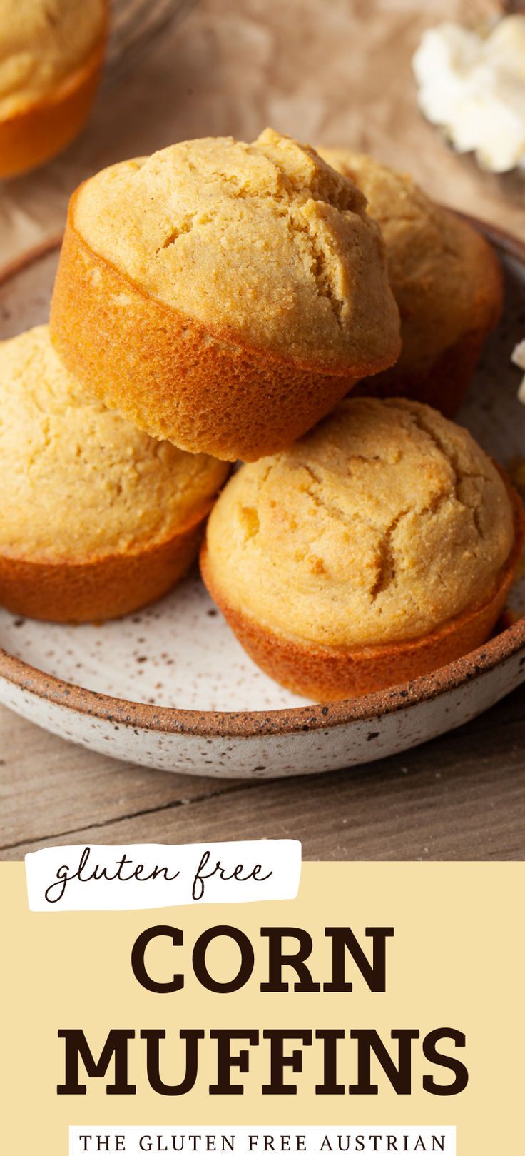 corn muffins on a plate with the title text reads gluten free corn muffins