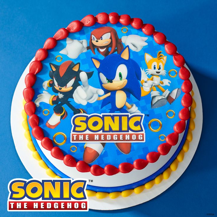 a sonic the hedgehog birthday cake on a blue background