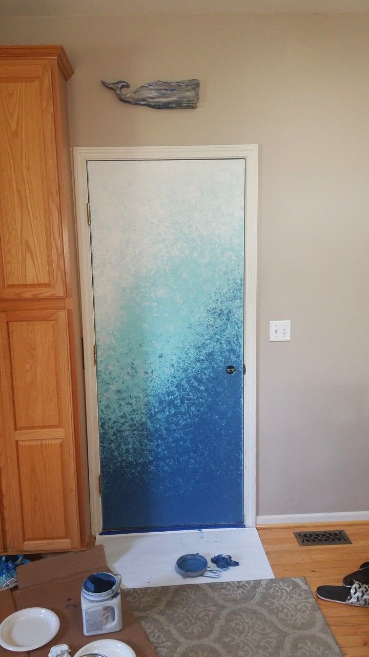 the door is being painted and ready to be installed in the living room or bedroom