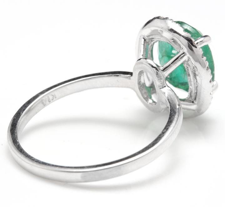 3.30 Carats Natural Emerald and Diamond 14K Solid White Gold Ring Suggested Replacement Value: $7,300.00 Total Natural Green Emerald Weight is: Approx. 3.00 Carats (transparent) (Oil Treated) Emerald Measures: Approx. 10.00 x 8.00mm Natural Round Diamonds Weight: .30 Carats (color G-H / Clarity SI1-SI2) Ring total weight: Approx. 3.6 grams Disclaimer: all weights, measurements and colors are approximate and may vary slightly from the listed dimensions or as seen in the image. All pictures are ma Modern Round Emerald Ring For Formal Occasions, Formal Oval Clear Rings, Formal White Gold Emerald Ring With Round Stone, Formal Round Emerald Ring With Prong Setting, Round Emerald Ring With Prong Setting For Formal Occasions, Formal Polished Emerald Ring, Modern Round Emerald Ring With Center Stone, Formal Round Emerald Ring, Formal Clear Rings With Prong Setting