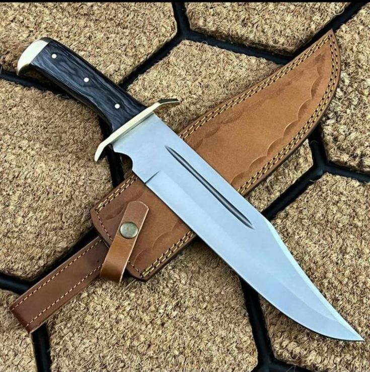 Big bowie knife available at Sharp edge cutlery company with leather sheath 
Handmade from 440 stainless steel and black dense wood handle Big Knife, D2 Steel, Dagger Knife, Cool Knives, Bowie Knife, Handmade Knives, Hunting Knife, Leather Sheath, Hand Forged