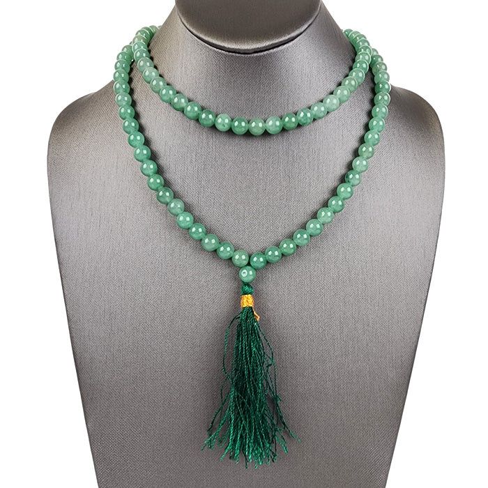 Enhance your spiritual journey with our exquisite Green Aventurine Mala Beads. Each of the 108 mala beads is made from Green Aventurine.  Also known as the “Stone of Opportunity”, Green Aventurine is revered for its metaphysical properties which include the ability to promote growth, prosperity, healing and harmony.  These Green Aventurine beads will encourage you to persevere until you find yourself in a position of leadership.         Each bead works with the other to promote the powerful ener Conjure Oil, Green Aventurine Crystal, Aventurine Crystal, 108 Mala Beads, Mala Beads, Green Aventurine, Heart Chakra, Spiritual Journey, How To Make Beads