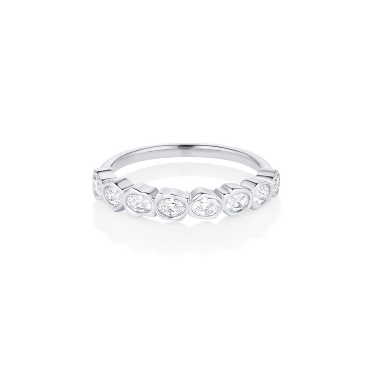 Add some sparkle to your fine jewelry collection with our White Diamond Abstract Bezel Band. Featuring 0.45tcw of oval white diamonds, this band feels modern yet classic and looks great stacked or solo. Bezel Band, Fine Jewelry Collection, Bezel Diamond, Oval Diamond, White Diamonds, White Diamond, Diamond White, Jewelry Collection, Fine Jewelry