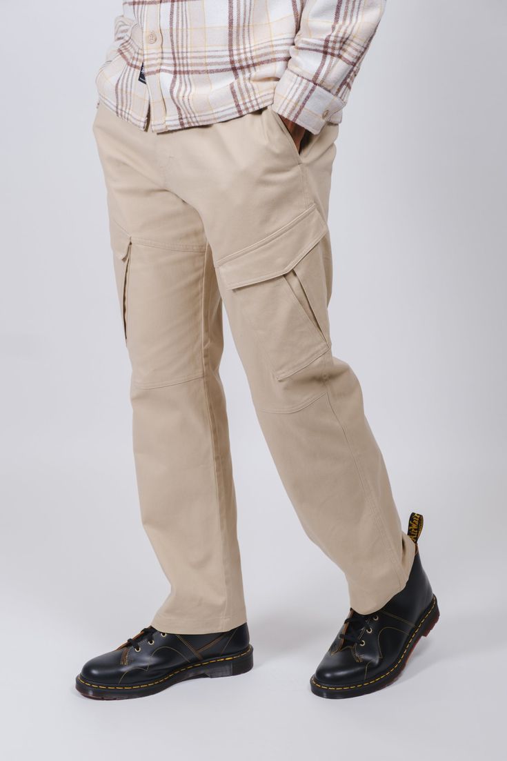 Experience the ultimate blend of style and functionality with our Diagonal Cargo Pocket Twill Jogger. Crafted from high-quality twill fabric, these joggers offer both durability and comfort. The innovative diagonal cargo pockets not only provide convenient storage but also add a unique and dynamic flair to the design. With an adjustable elasticized waistband and tapered legs, these joggers ensure a tailored fit that's perfect for any occasion, whether you're lounging or on the go. Elevate your w Functional Cotton Cargo Pants, Functional Cargo Pants With Multiple Pockets For Work, Functional Cargo Pants With Cargo Pockets For Work, Functional Straight Leg Pants With Cargo Pockets, Functional Cotton Pants With Pockets, Khaki Utility Chinos With Cargo Pockets, Utility Khaki Chinos With Cargo Pockets, Cotton Cargo Pants With Functional Pockets For Outdoor, Functional Cargo Jeans With Side Pockets