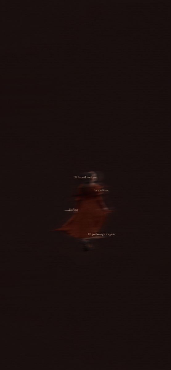 a blurry photo of a person in the dark