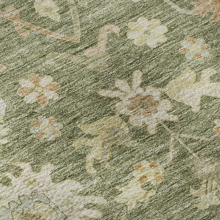 an old rug with flowers and leaves on it