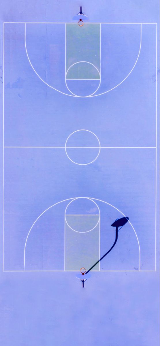 an overhead view of a basketball court with two people standing on one side and the other half