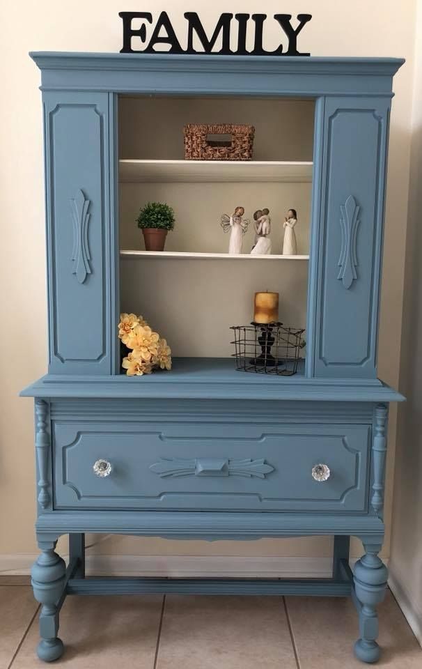 a blue cabinet with the word family written on it