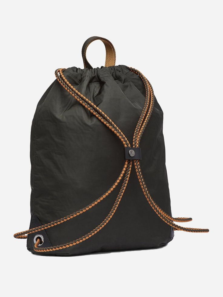 Lightweight and impressively strong, the Mismo Drawstring merges sporty with classy for the modern nomad. Double-bonded water resistant Italian nylon, two-tone sailor rope, and everlasting gun-metal eyelets offer up luxurious functionality. It's equipped with full-grain bridle leather details that offer reinforcement around eyelets and the bag's bottom. Three easily accessible inside pockets offer practicality for all of your essentials in tow. Versatility and refinement at its best. Hand polish Rope Handles, M S, Drawstring Bag, Drawstring Backpack, Inside Pocket, Two Tone, Blue Black, Clutch Bag, Backpacks