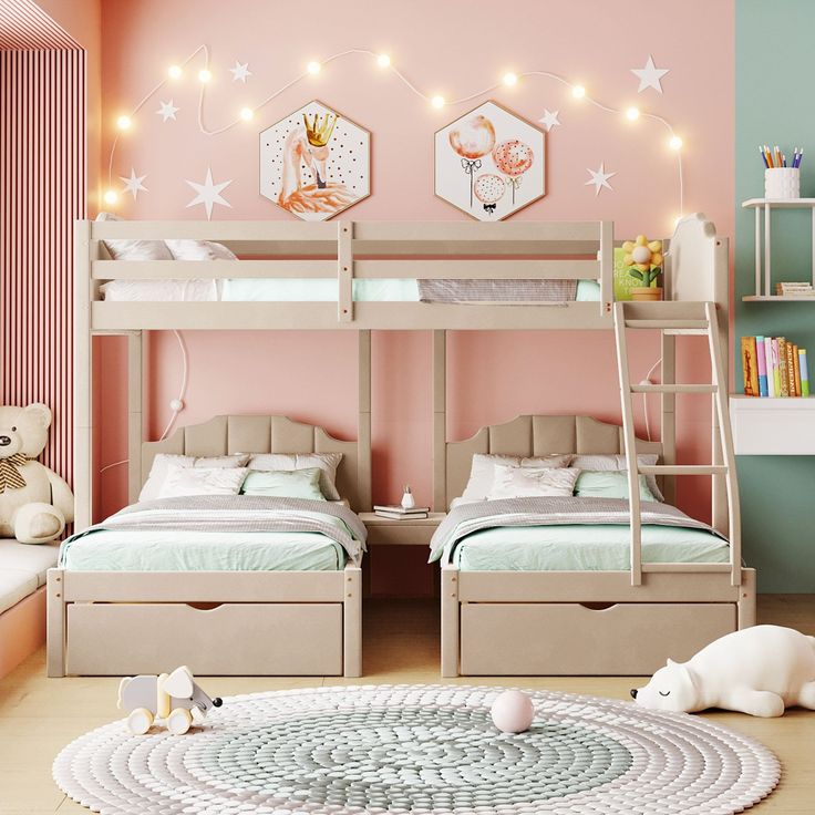 two children's bunk beds in a bedroom with pink walls and white stars on the ceiling