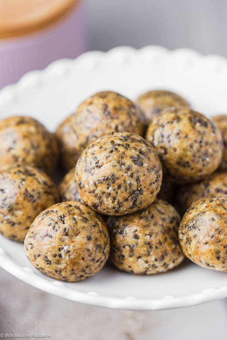 a white plate filled with balls of food