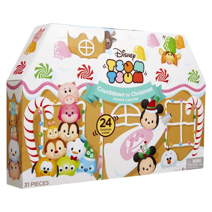 a box with mickey mouses and other characters on the front, including gingerbread house