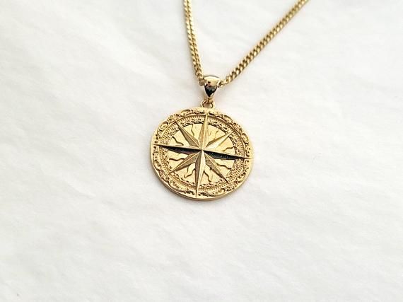 men's circle compass necklace pendant 1 made in 14k or 18k solid goldthis compass necklace pendant is inspired by classic compass.all features are so exquisite. you can see how it is described in detail with unaided eye.model wears a 2.1mm 60cm chain.the diameter of it is 24.0mm.14k gold compass necklace weightpendant only 5.33g (±7%)with a 1.7mm 42cm chain 9.10g (±7%)with a 2.1mm 42cm chain 11.03g (±7%)with a 2.4mm 42cm chain 13.08g (±7%)18k gold compass necklace weightpendant only 6.35g (±7%)w Luxury Gold Necklace With Compass Design, Timeless Medallion Jewelry With Compass Design, Gold Compass Design Pendant Jewelry, 14k Gold Compass Design Round Pendant Necklace, Gold Pendant Jewelry With Compass Design, Timeless Gold Necklace With Compass Design, Luxury Round Pendant Necklace With Compass Design, Luxury Compass Design Round Pendant Necklace, Luxury Compass Medallion Jewelry