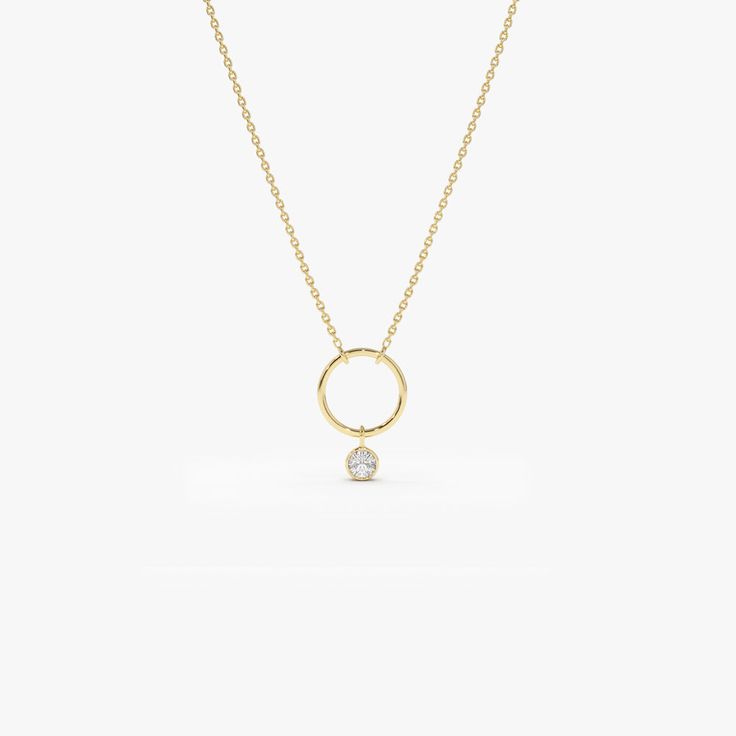 Made to Order.
Gold Kt: 14K Solid Gold
Available Gold Color: Rose Gold, Yellow Gold, White Gold
Round Diamond: 1 pc 2.5 mm 
Total CTW: 0.08 Ctw
Diamond Color Clarity: G Color Si1 Clarity
Setting Type: Bezel Setting
Circle Diameter- 8mm Diameter x 1mm Thickness

Minimalist and modern, our gold circle necklace will add a fashion-forward look to your everyday wear. The necklace features an open circle pendant adorned with a single round cut diamond in a bezel setting. Handcrafted from 14k solid gol Round Solitaire Diamond Necklace, Diamond Circle Necklace, Gold Circle Necklace, Horoscope Necklace, Star Necklace Silver, Diamond Solitaire Necklace, Circle Pendant Necklace, Gold Charm Necklace, Circle Diamond