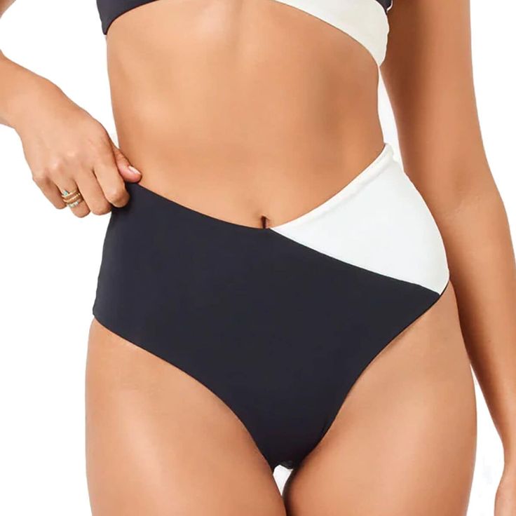 The LSPACE High Tide Bottom Classic is our go-to for beach trips, days by the pool, and hanging at the lake. The high-waisted design sits comfortably on our lower stomach, while the moderate coverage keeps us feeling classy. High Rise Bottoms For Beach Season Sunbathing, High Waist Bottoms For Poolside Vacation, High Rise Bottoms For Summer Sunbathing, Summer High-cut Leg Swimwear For Beach, Summer Swimwear With High-cut Leg For Beach, Summer High-cut Leg Bottoms For Sunbathing, Black High-cut Leg Swimwear For Summer, High Waist Beachwear Bottoms For Vacation, High Waist Summer Bottoms For Pool