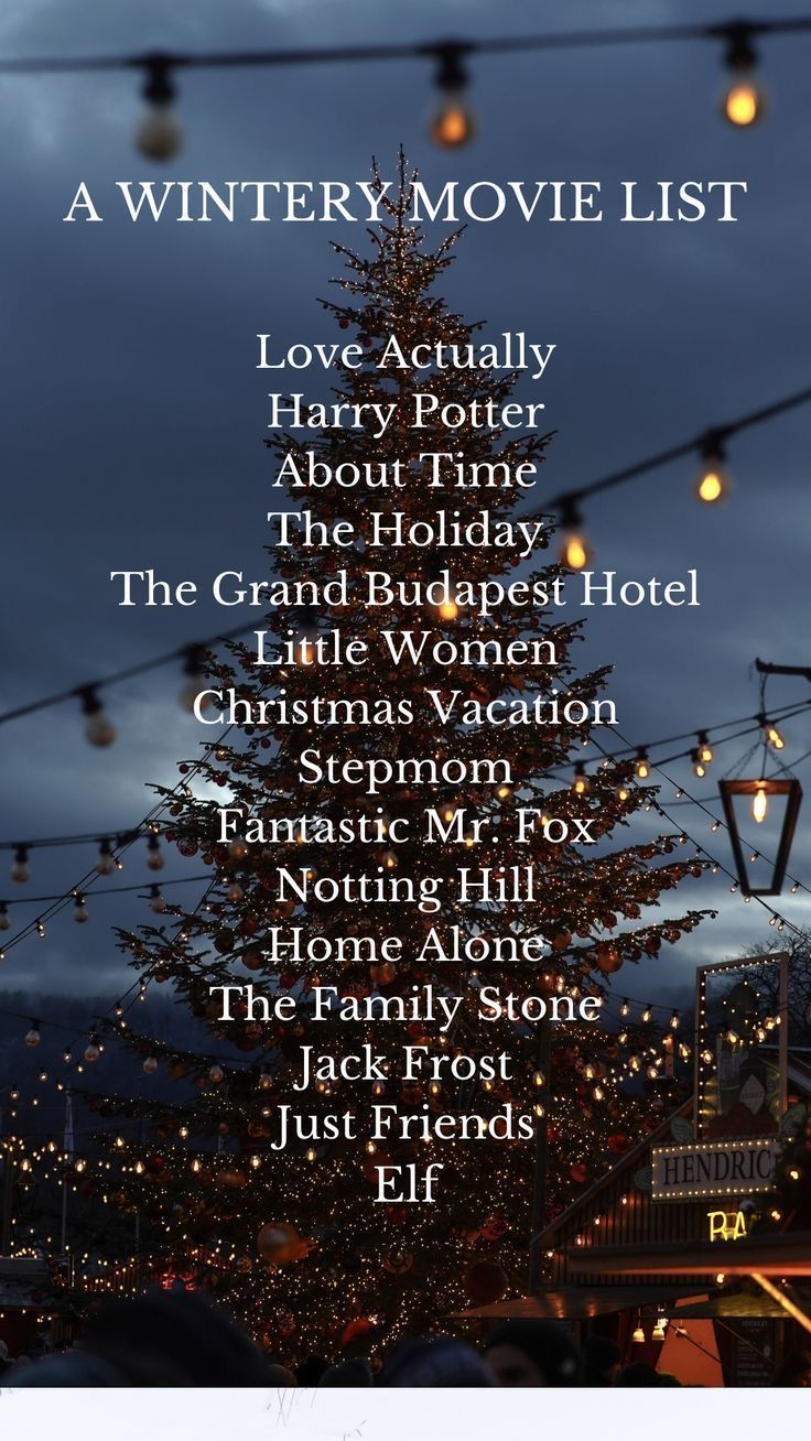 a christmas movie list with lights hanging from the ceiling